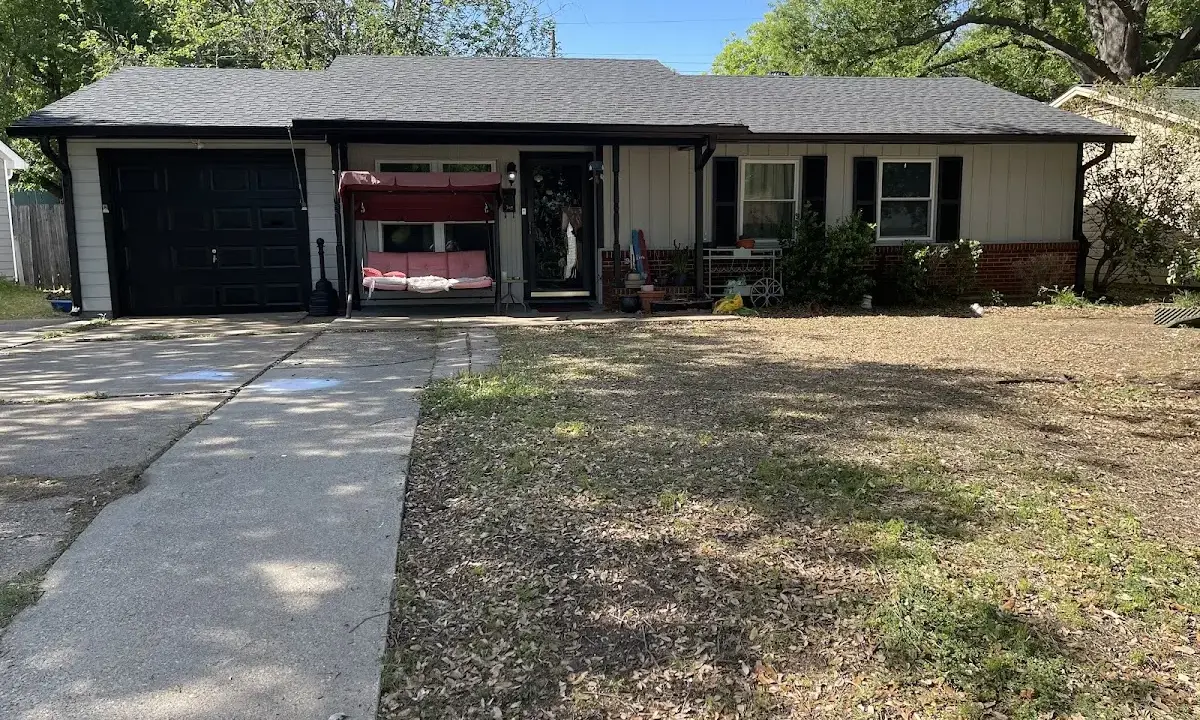 Asphalt Shingle Roof Repair crew at work on a residential roof in Wright